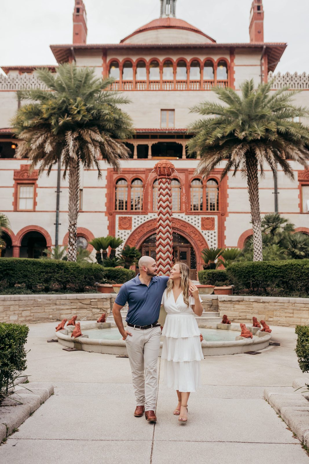 A couple at the Flagler College courtyard fountain in St. Augustine