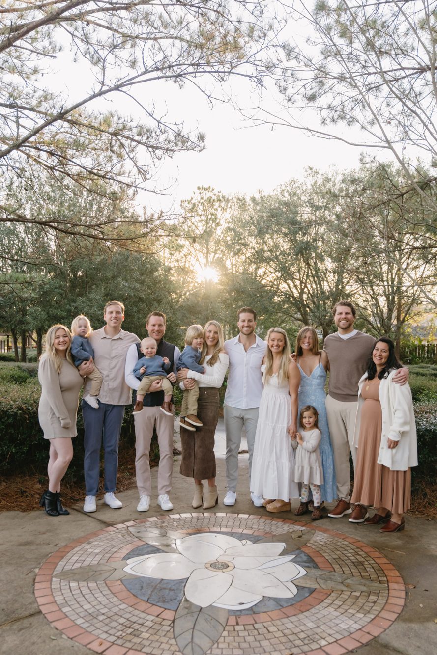 Extended family gathered at sunset on the magnolia mosaic at Bird Island Park in Ponte Vedra Beach FL by Lee Photo + Video