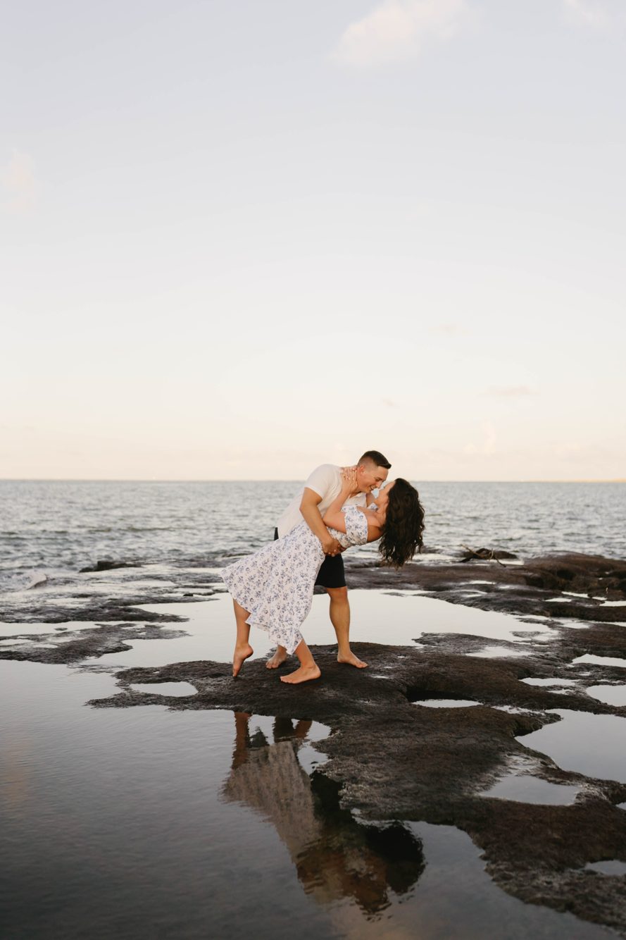 Couple walking the shoreline among driftwood at sunset, Black Rock Beach on Big Talbot Island FL by Lee Photo + Video