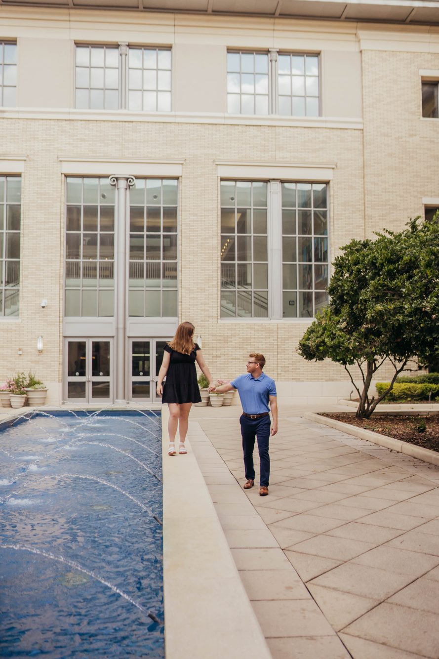 Couple kissing in the antique map room of the Downtown Jacksonville Main Library, Florida by Lee Photo + Video