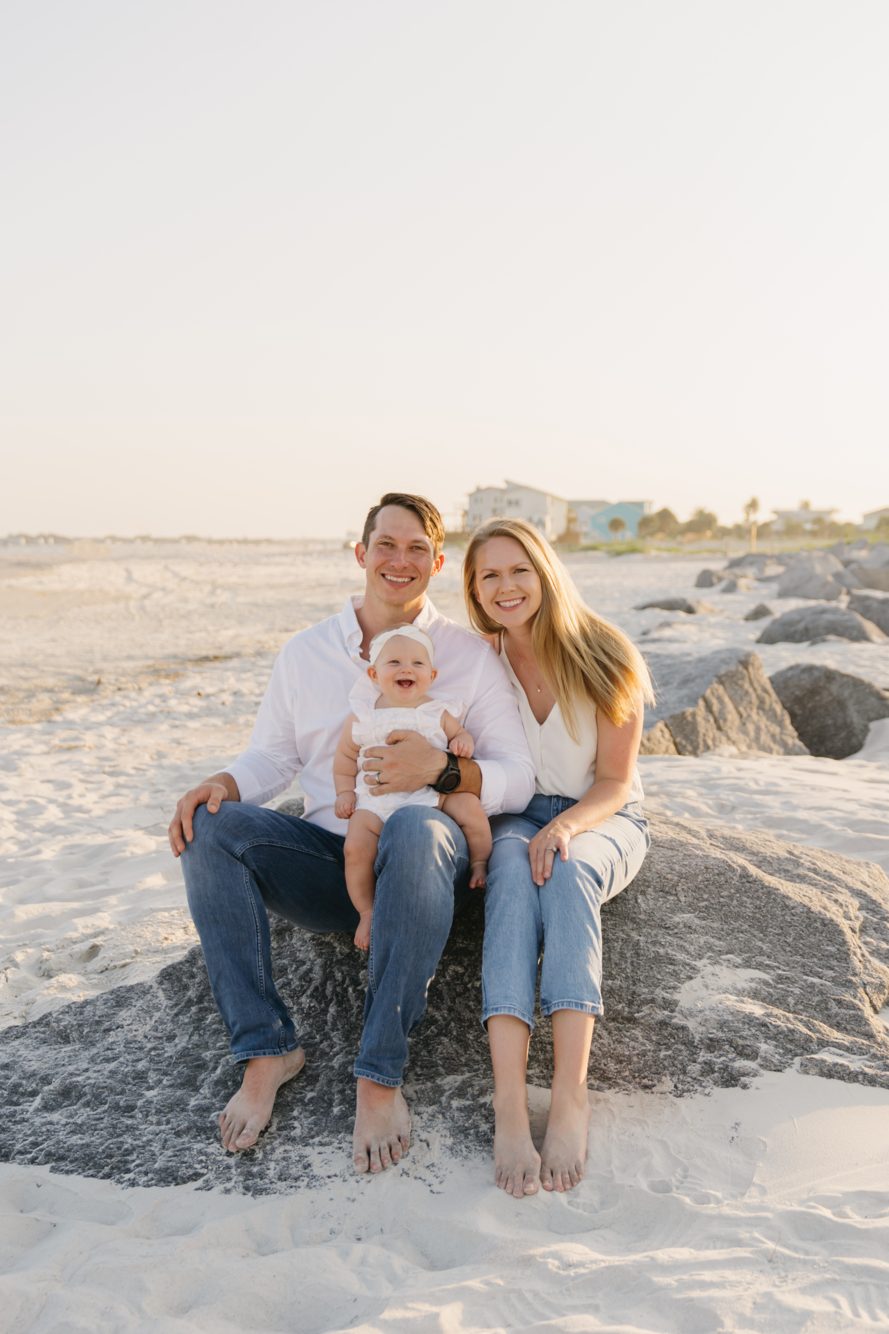 Couple kissing with golden retriever and goldendoodle on the dune path at Vilano Beach by Lee Photo + Video