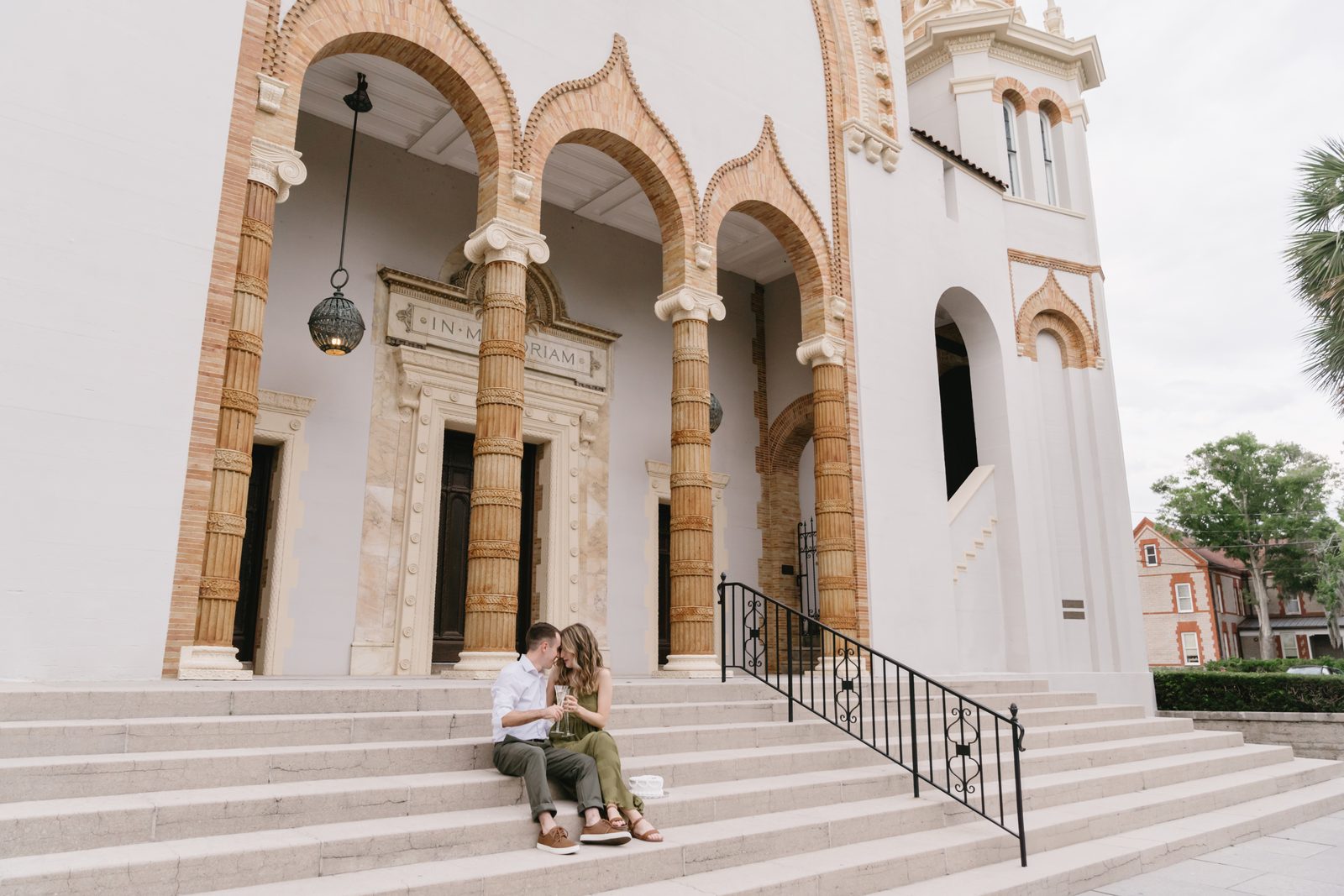 A couple on the steps of Memorial Presbyterian Church in St. Augustine