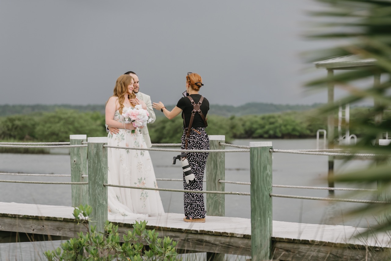 Sydney Lee working with a bride and bridal party