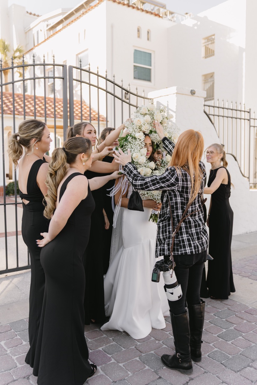 Sydney Lee celebrating surrounded by cameras