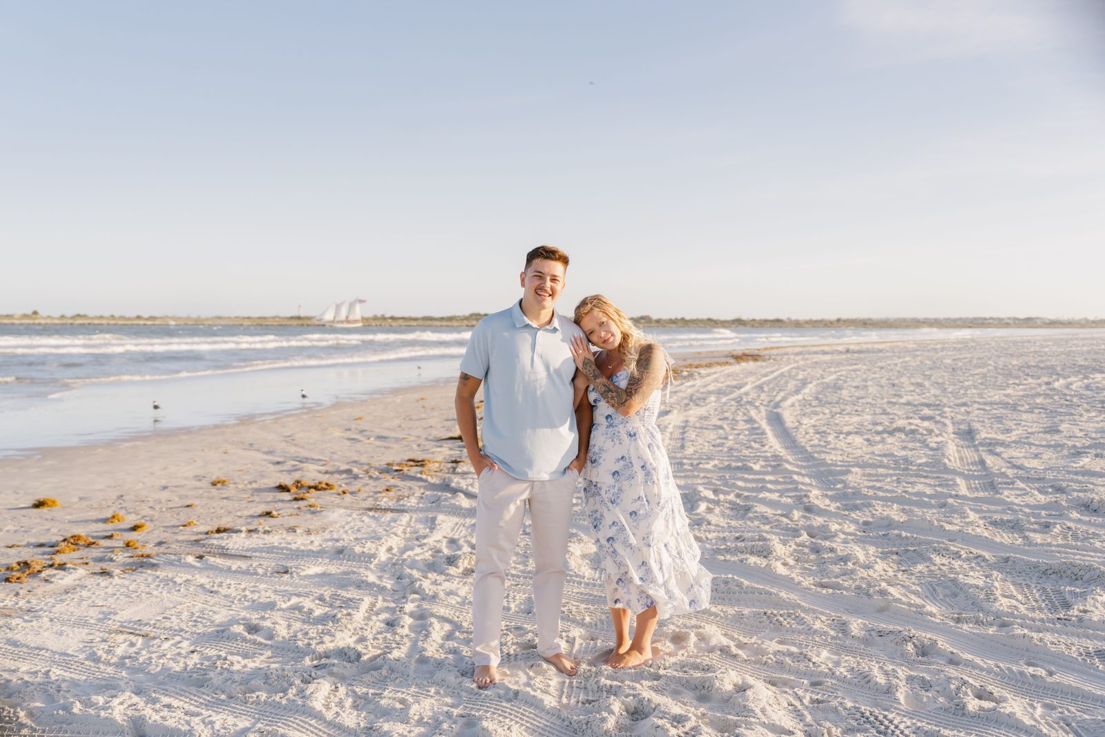 A couple on the sand at Vilano Beach near St. Augustine at sunrise
