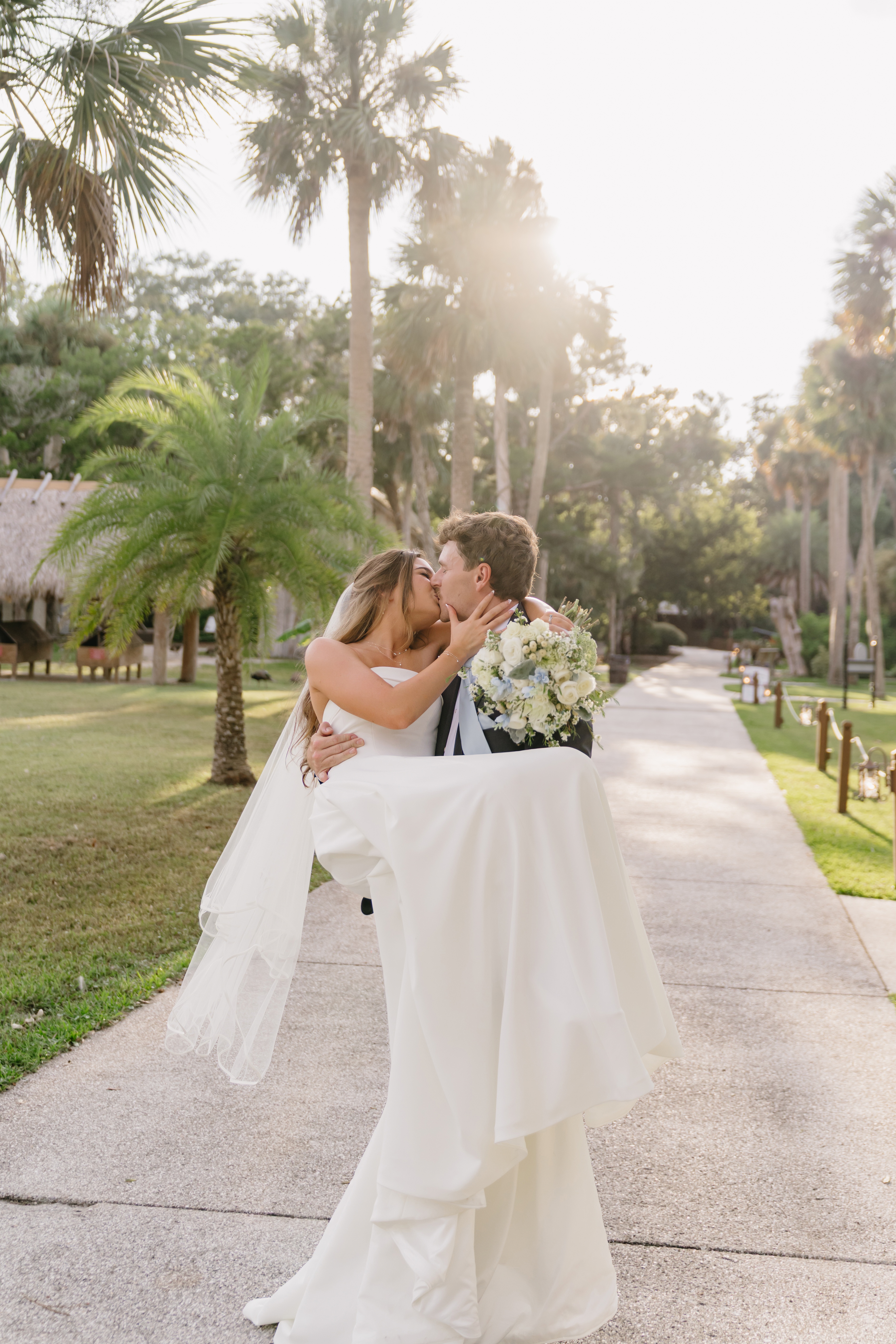 Bride and groom candid moment captured by Jacksonville wedding photographer Sydney Lee